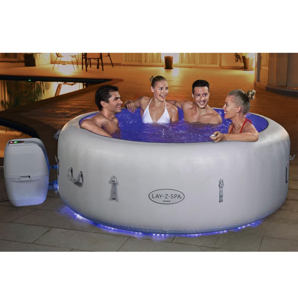 vier Menschen entspannen sich im LAY-Z-SPA® Paris AirJet™ Whirlpool, 196 x 66 cm, 4-6 Personen, rund, weiß